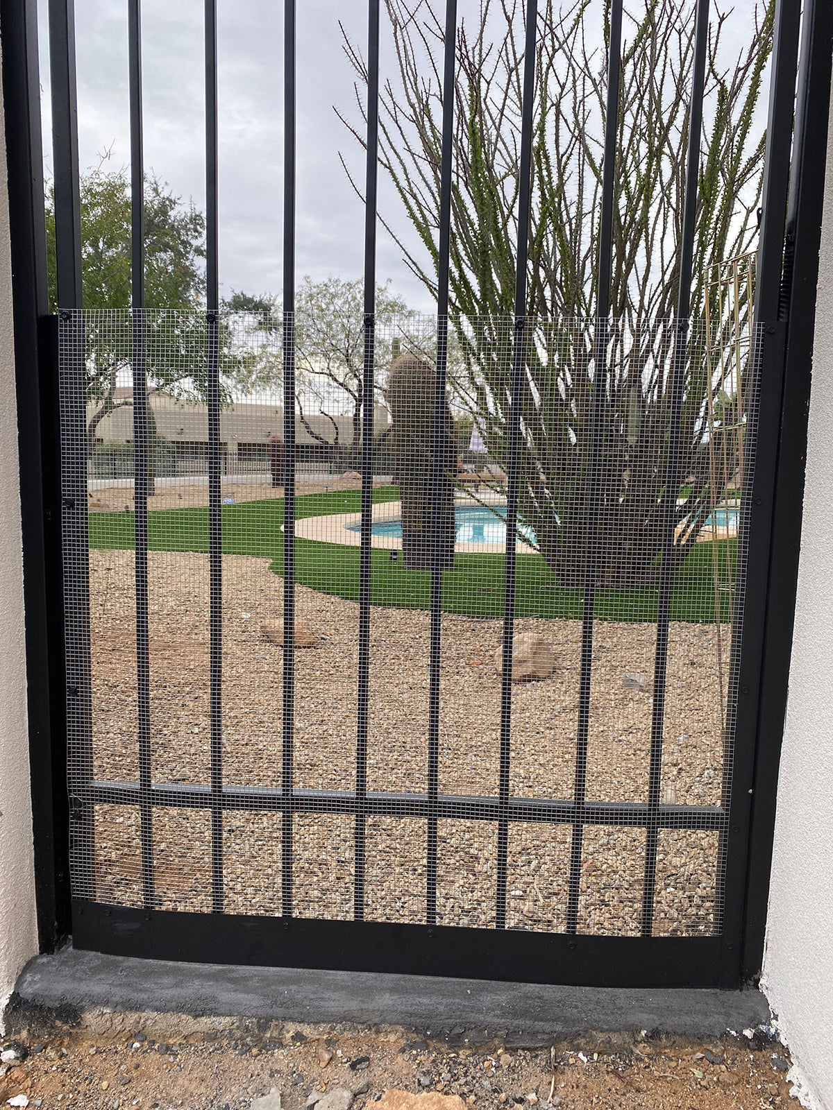 Snake fencing installed on a gate