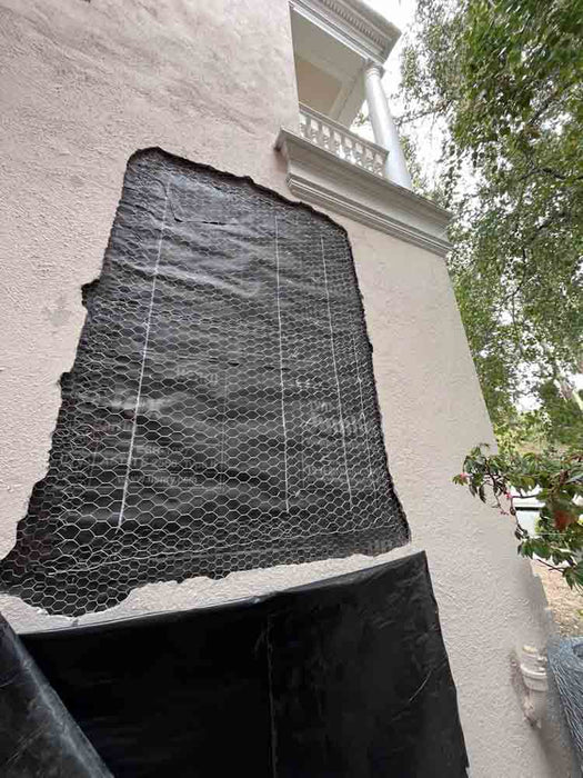 Stucco Lath Being Installed on section of house