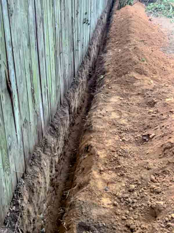 Under Fence Weed Barrier