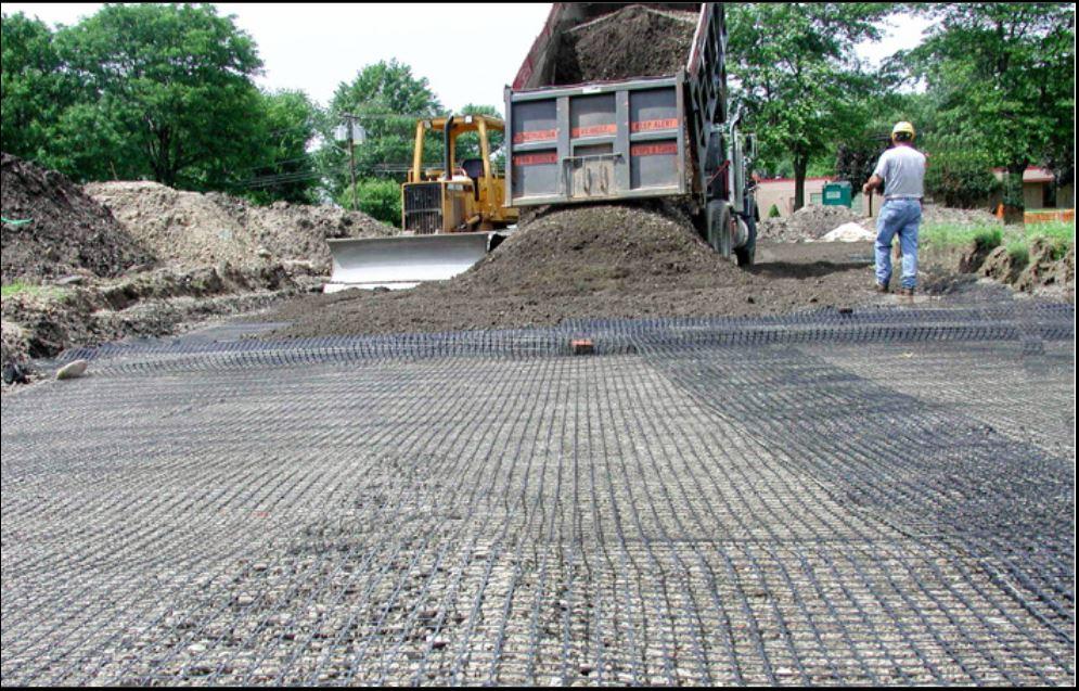 GBX-11 geogrid being installed as roadbase