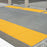 Armor Tile Cast In Place Detectable Warning Mats yellow at crosswalk